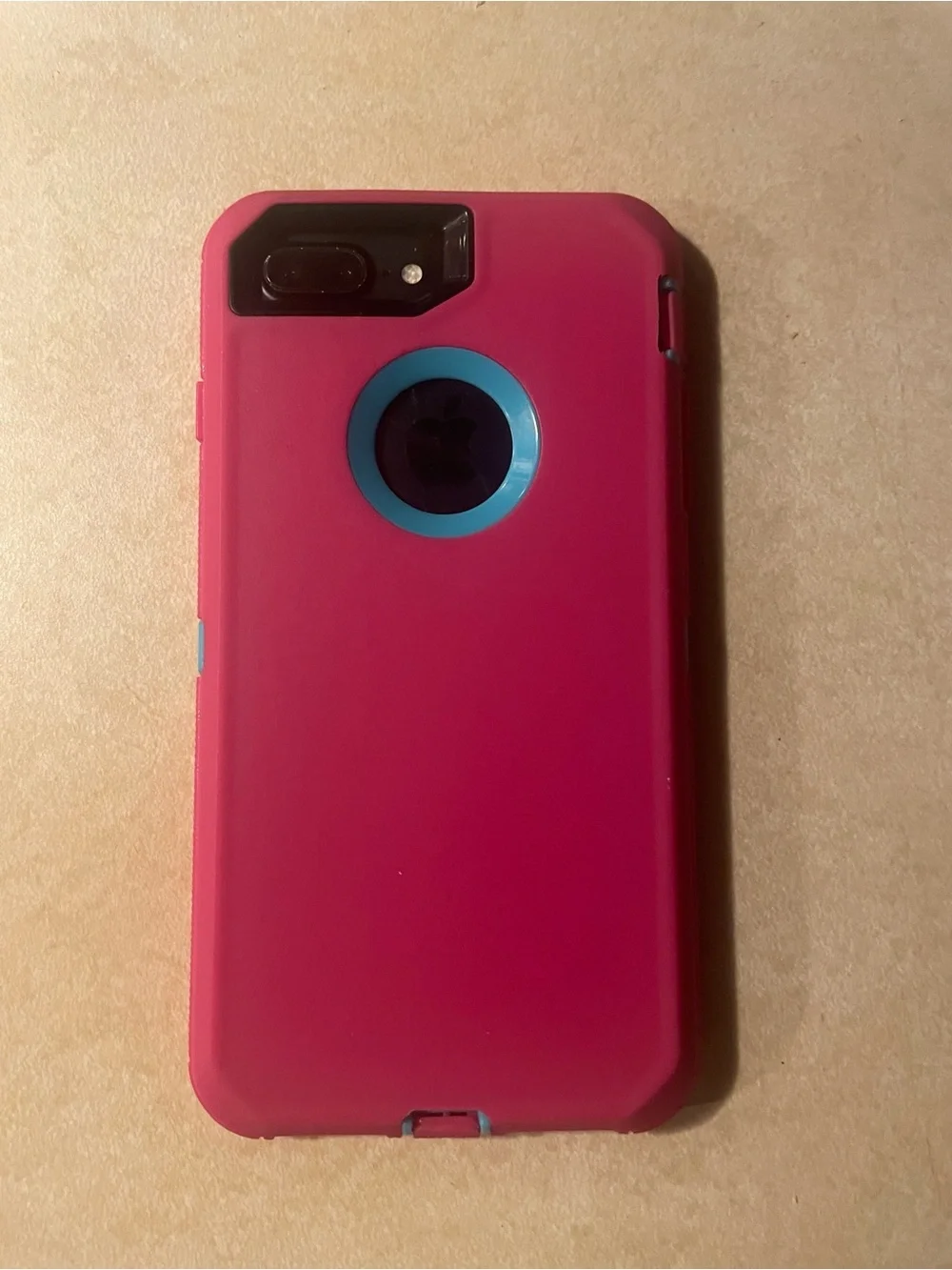 Apple IPhone 7 Plus with Pink and Teal Protective Phone Case with Front Frame.